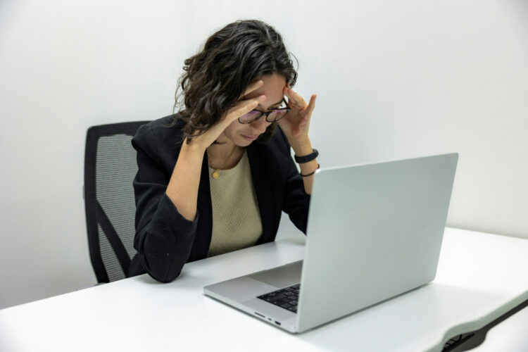 sad lady at desk