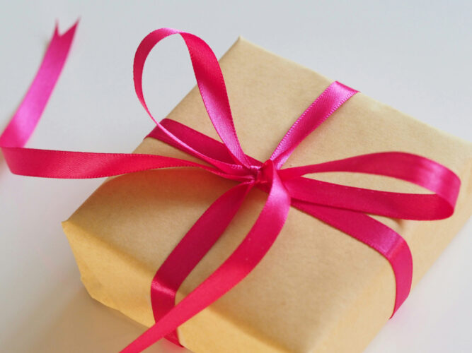 wrapped gift with pink bow